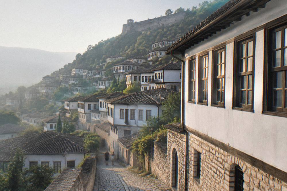 Windows of white Ottoman houses in Mangalem catching the evening light