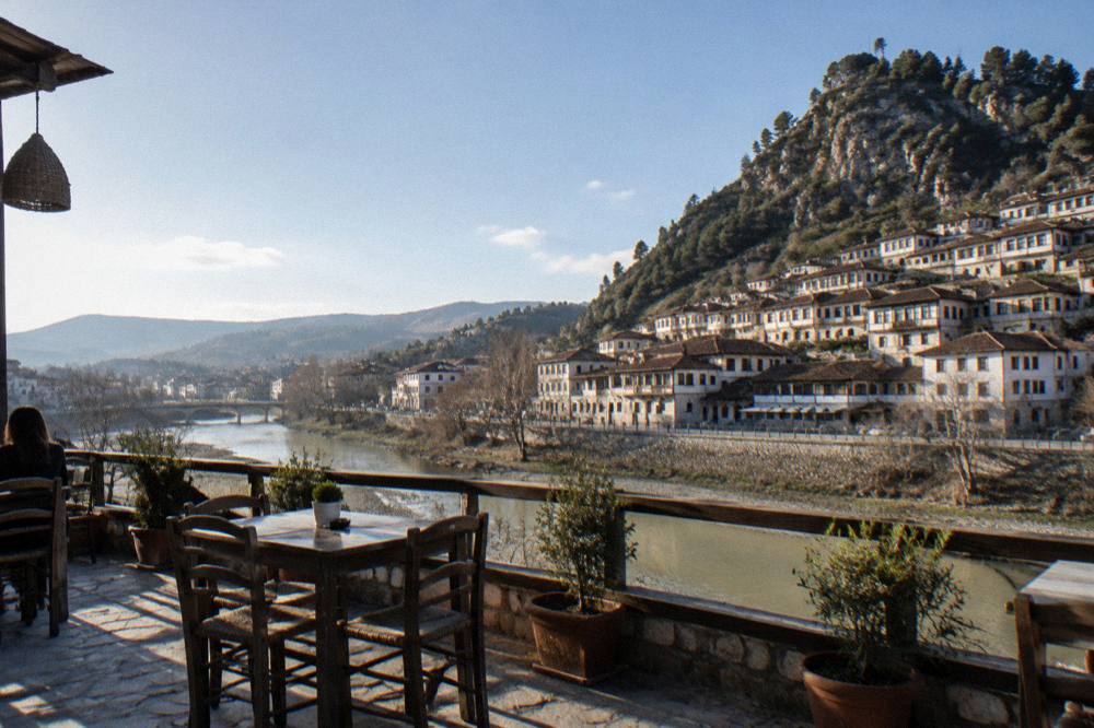 A guesthouse terrace overlooking the rooftops of Gorica and the river in Berat