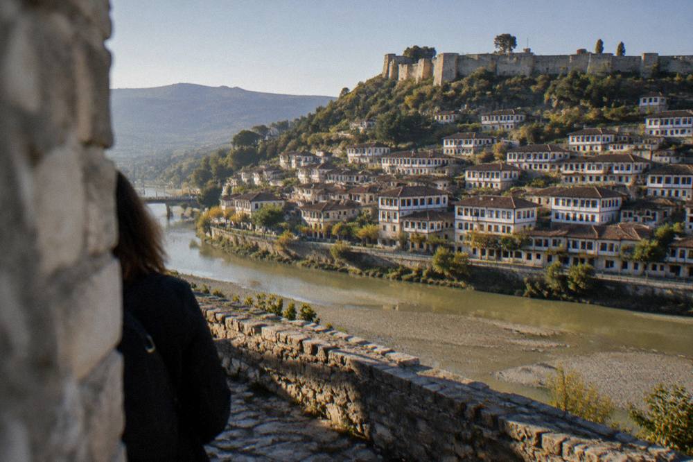 View across the Osum River toward the white houses of the Mangalem quarter in Berat