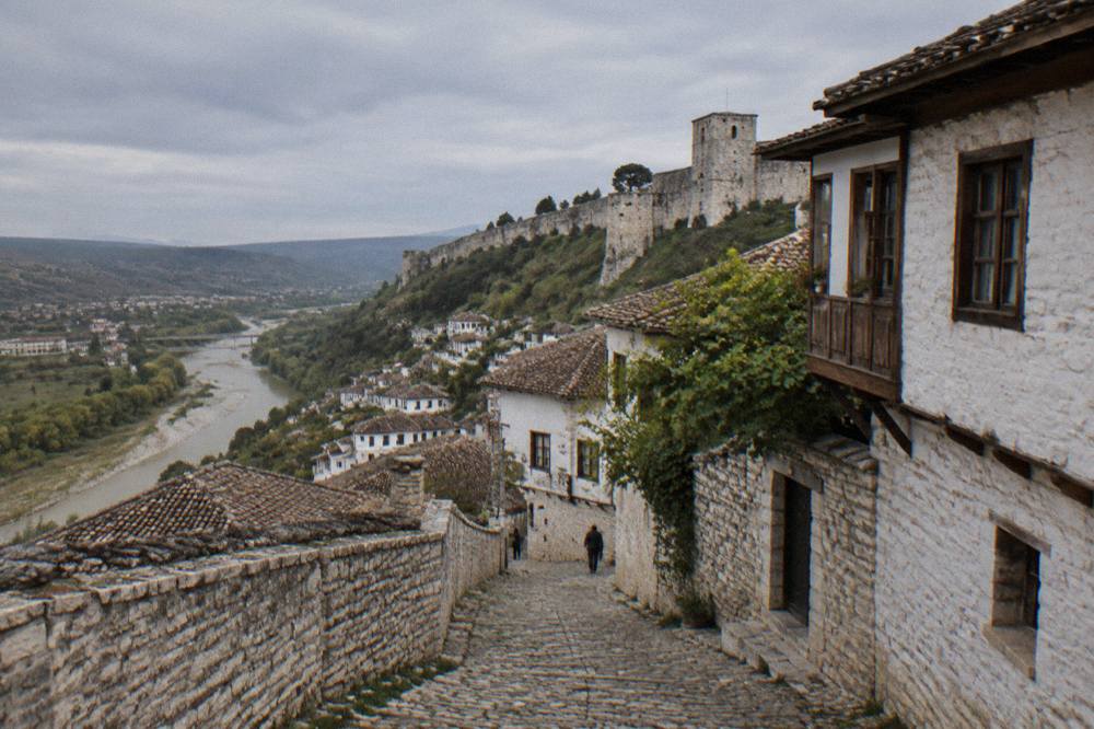 Cobbled lane between stone houses in an Ottoman-era quarter