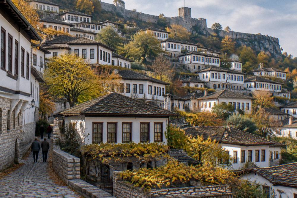Autumn light over the rooftops of the Mangalem quarter with vine leaves turning yellow