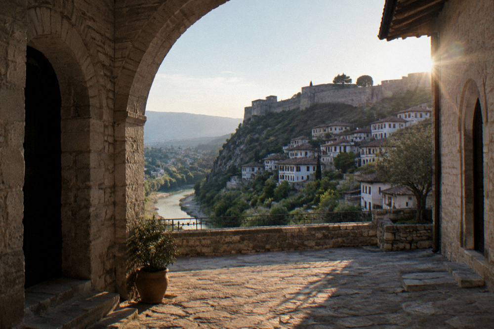 Stone courtyard and arched entrance of a restored museum building in Berat