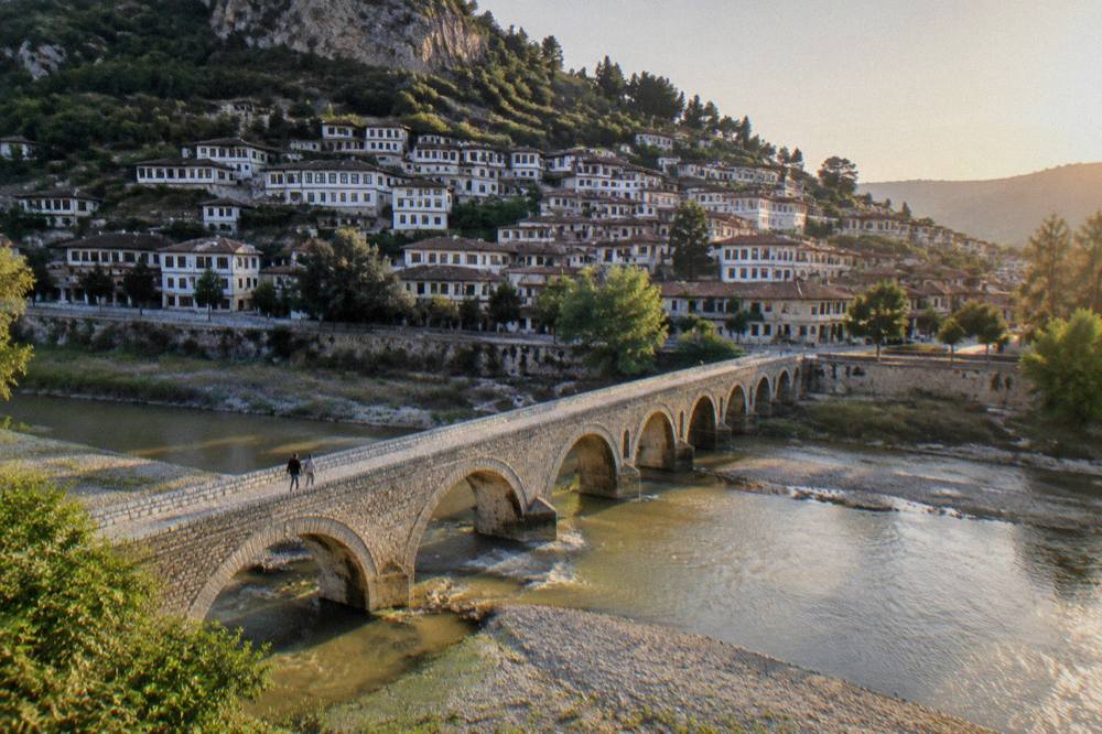The Gorica bridge over the Osum river at dusk in Berat