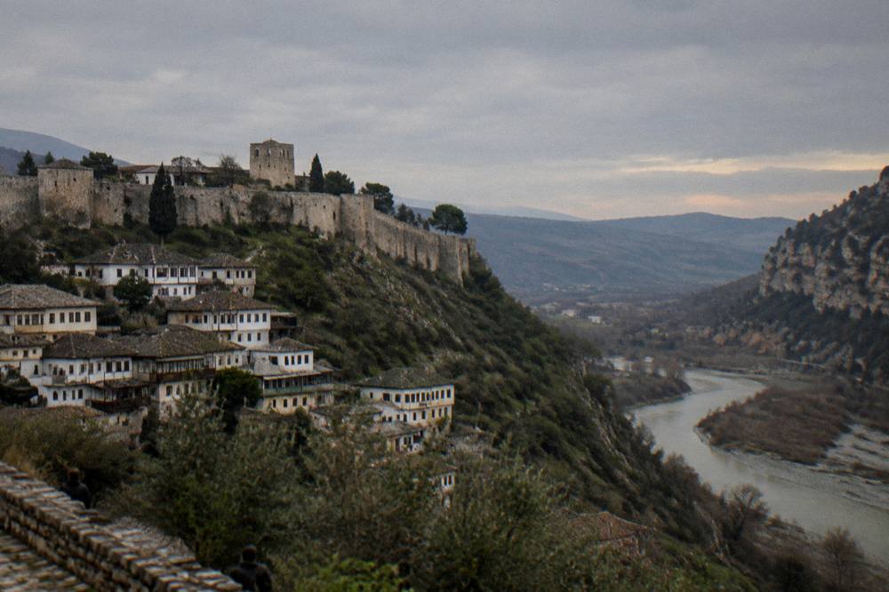 A deep river canyon with sheer rock walls under an evening sky in Albania